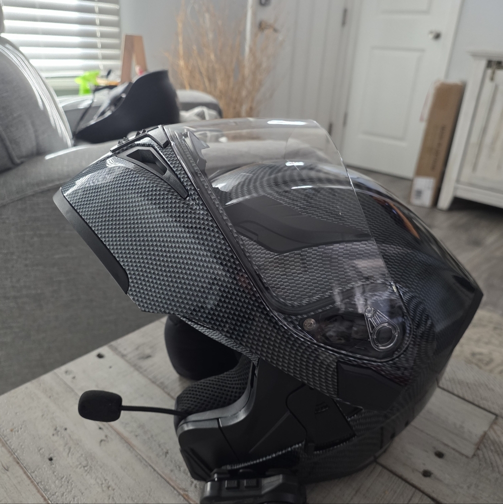 Like new, motorcycle helmet full face with bluetooth headset.